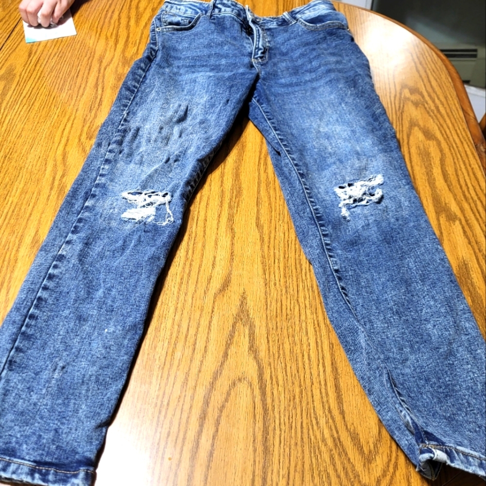 Distressed Blue Jeans
